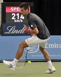 Học tennis nâng cao-Đánh bóng qua hai chân